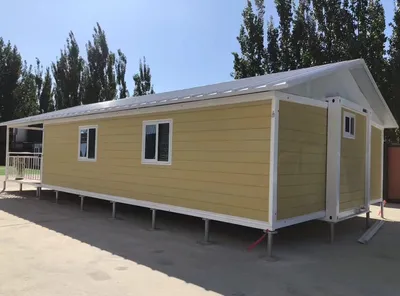 Prefab Expandable Container House with Deck Fence and Roof Top