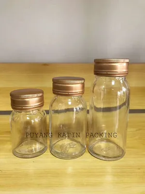 Molded Screwed Clear Glass Bottle for Packing Honey and Bird′s Nest